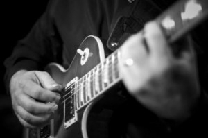 Close up of Steve playing guitar