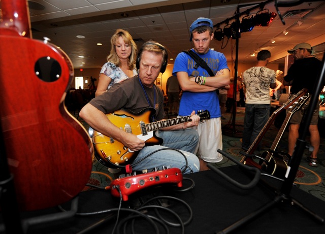 Guitar Students Tuning the Guitar