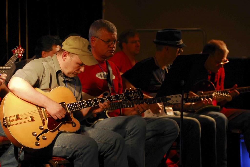 guys playing guitar