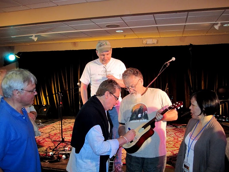 Martin Taylor Signing a Guitar