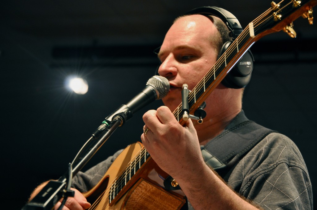 steve krenz playing guitar at the mic