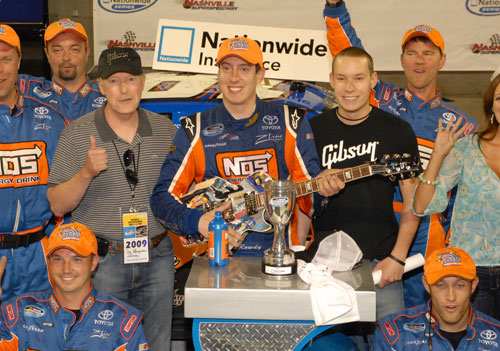 NASCAR's kyle busch donates guitars to students