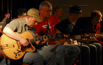 Gibson's Learn and Master Guitar Students Playing